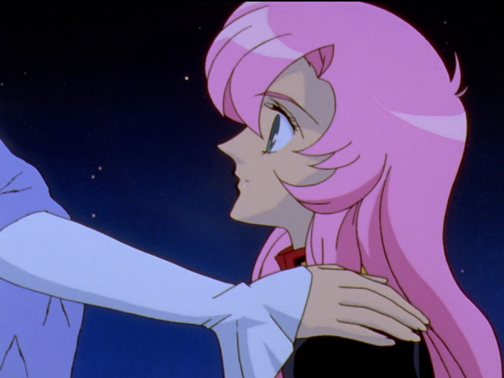 Utena looks up a Juri, who is about to try to take her ring.