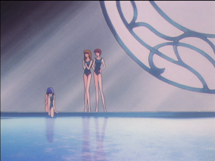 Kozue and two of her friends are reflected in a swimming pool.