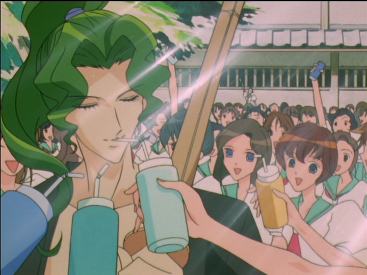Saionji densely surrounded by delighted girls, the closer ones offering sports water bottles with straws. At the crowd’s edge in the distance, Wakaba jumps for attention.
