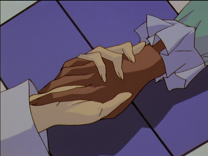 Close view of the same, Anthy and Utena holding hands.