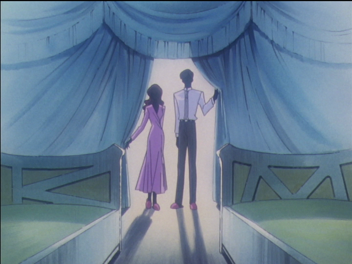 The Kaoru parents stand in the door of Kozue and Miki’s room.
