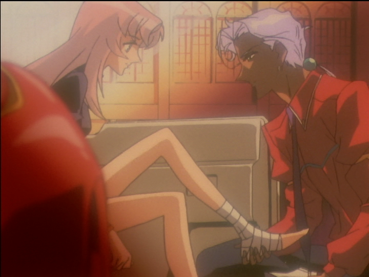 Akio has removed the shoe from Utena’s injured left foot.