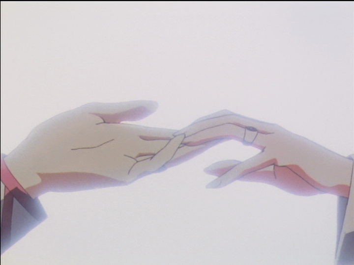 Touga’s and Utena’s hands part.