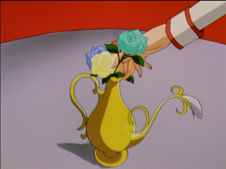 Saionji places his rose in the vase/watering can. The background is solid red.