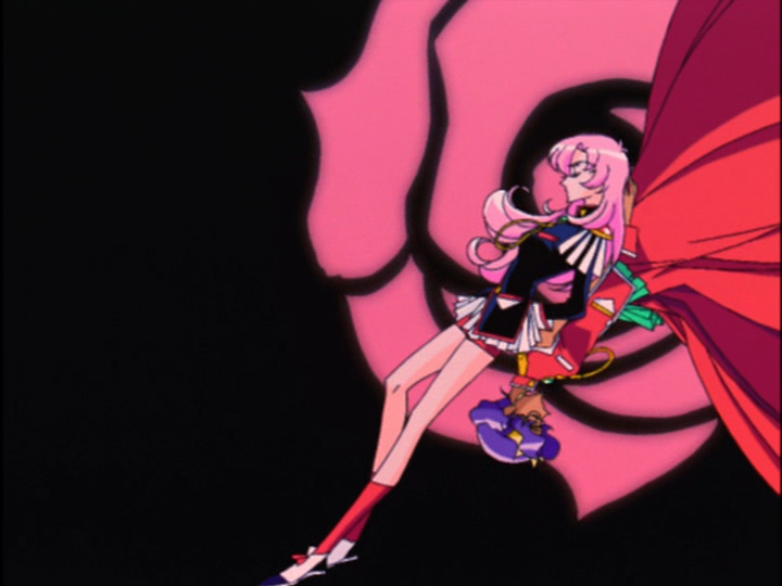 Utena and Anthy stand back to back on a rose background, Anthy upside down.