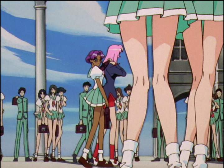 Students line Utena and Anthy’s path, in groups of boys and girls.