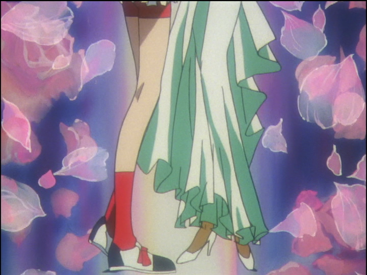 Anthy is wearing white high heels as she dances with Utena.