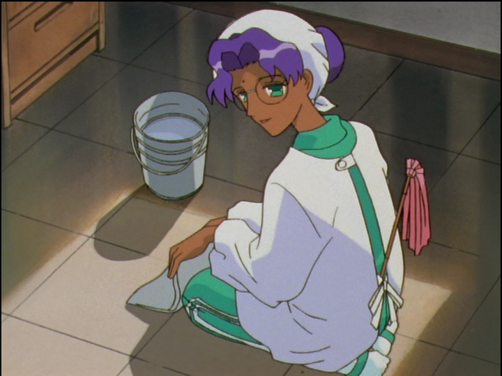 Anthy wears a smock while cleaning the room in the empty dorm.