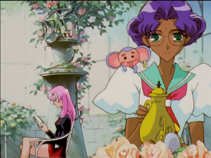 Utena reads a book in the greenhouse as Anthy waters the roses.