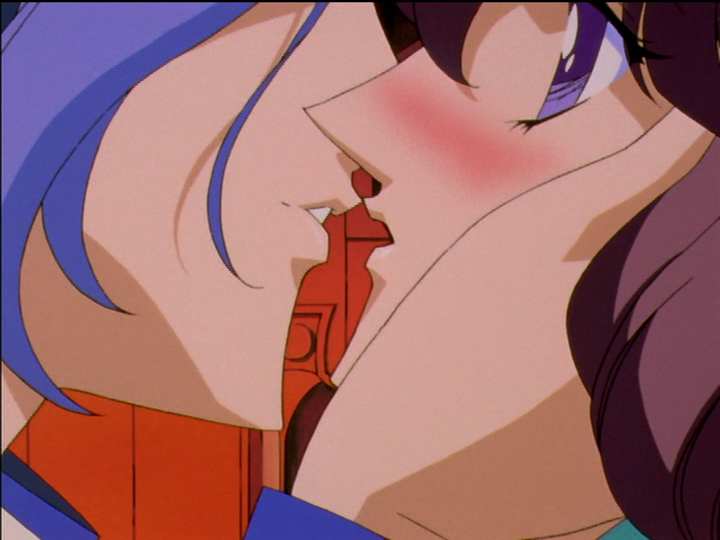 A close-up: Ruka is about to kiss Shiori, his hand on the side of her head.