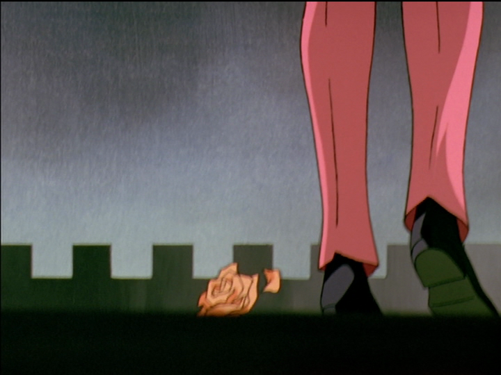 One petals detaches from Juri’s orange rose as it hits the ground.