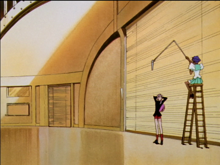 Anthy holds a boom mic over Utena.