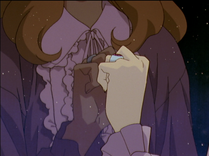 Nanami, reflected in a window, tries to grasp her reflection’s heart.