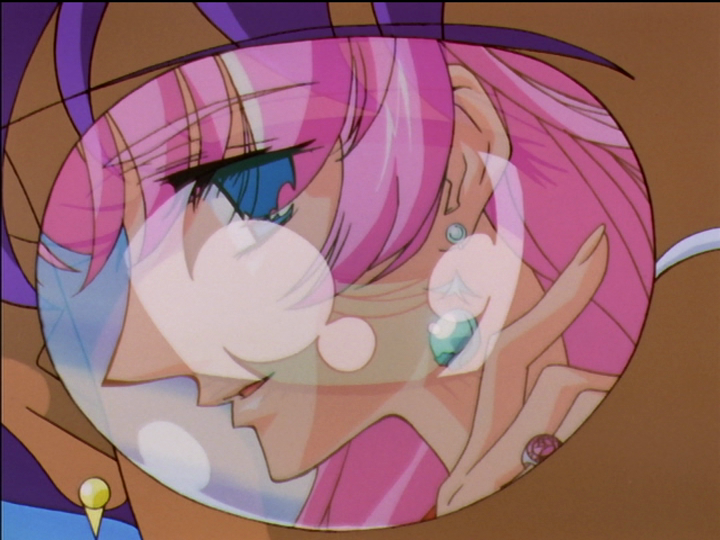 Reflection in Anthy’s glasses of Utena wearing the earrings from Touga.