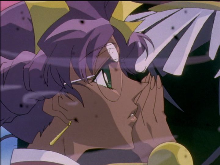 Anthy is behind Utena with her hand on her back.