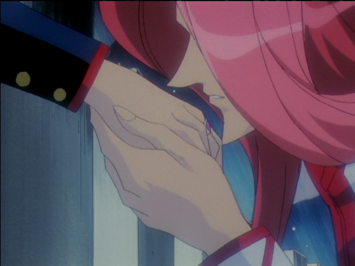 Touga moves to kiss Utena’s hand.