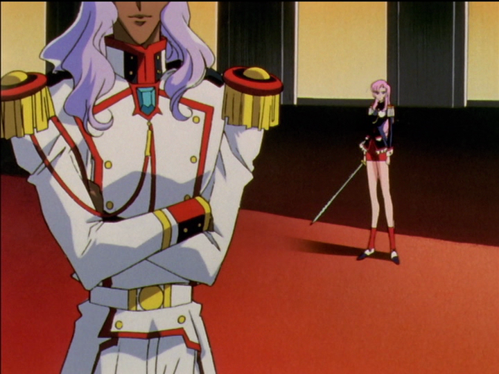 Akio, with Utena in the background. Akio’s eyes are off the top of the frame.