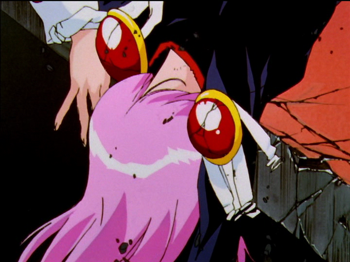 Utena is prone on the walkway to Anthy’s coffin, wind blowing her dangling hair.