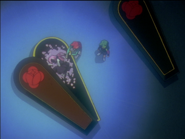 Utena’s coffin from above, with Touga, Saionji, and Utena.